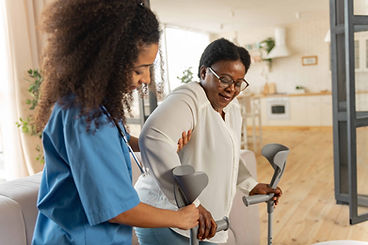 Caregiver helping disabled