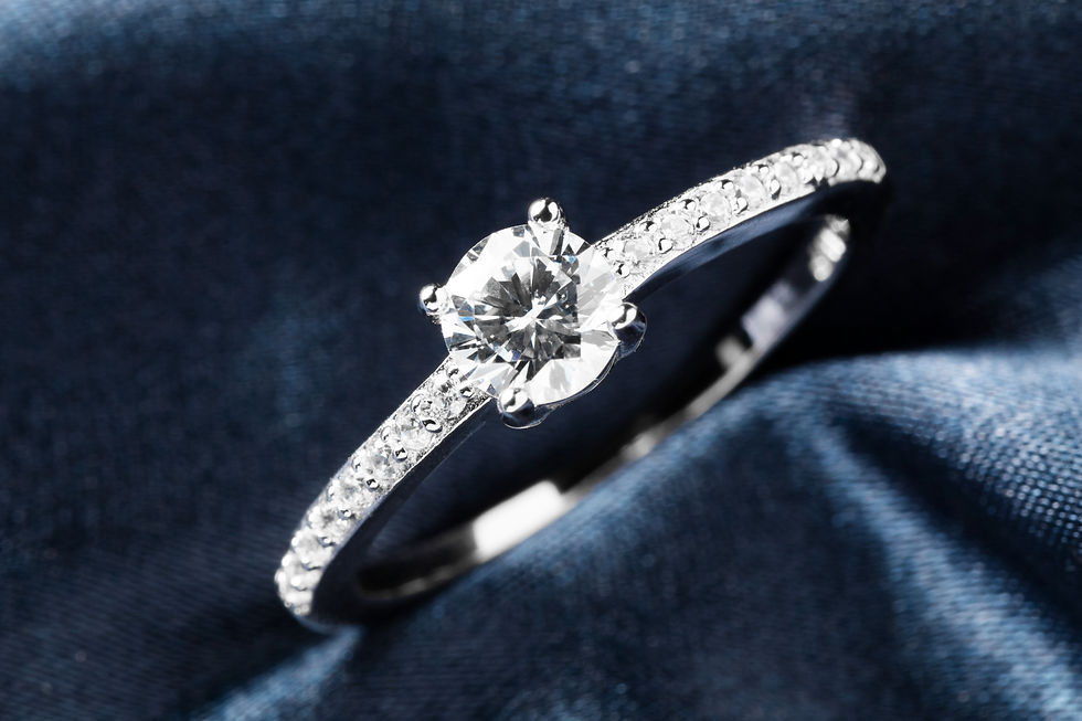 Cherish & Co couple with bespoke oval diamond ring