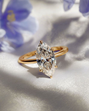A 2.0 carat marquise lab-grown diamond in warm yellow gold, crafted in a minimalist solitaire that highlights the stone’s unique silhouette. A ring that feels radiant, modern, and forever captivating.