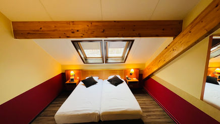 Suite familiale spacieuse avec lits séparés à l'hôtel Melba