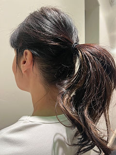 Ponytail hairstyle showing discreet K-tip hair extensions with seamless, hidden placement