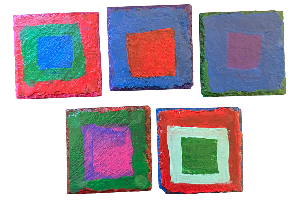 Hand painted coasters on slate