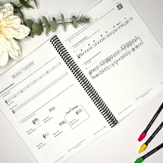 Music Theory pages with flowers and pencils