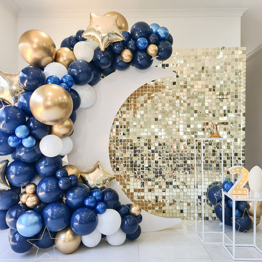 gold shimmer sequin wall with moon crescent