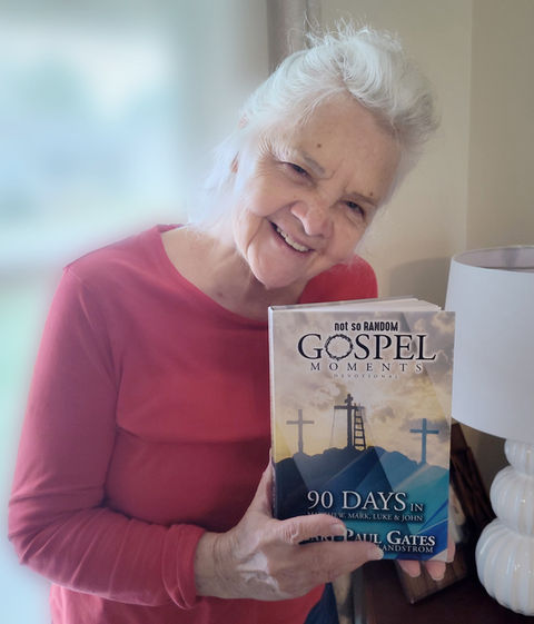 Janice Pate holding her copy of Not So Random Gospel Moments
