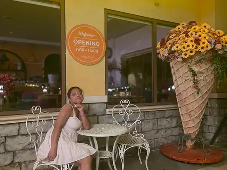 Phu Quoc South Island - Flexi tour centre's customer taking picutre in front of a cafe