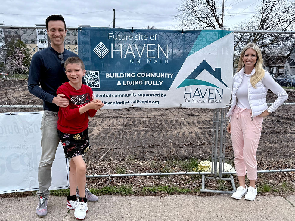 Rae family at future site of Haven on Main in La Crosse, WI.