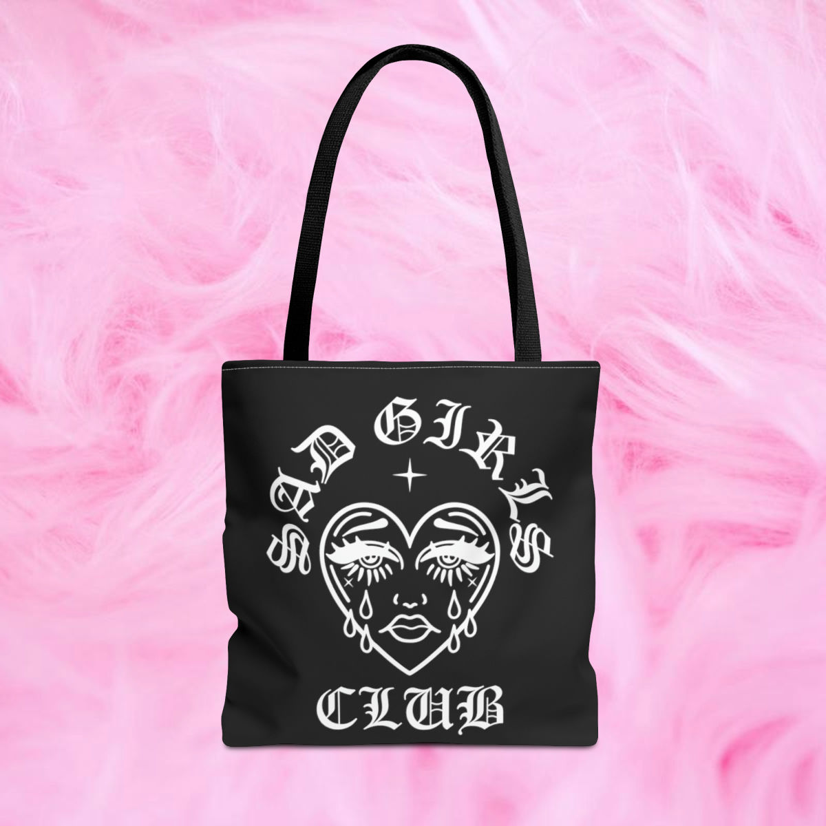 Black tote bag with 'SAD GIRLS CLUB' graphic