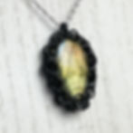 labradorite crystal pendant necklace of chain mail black anodized rings is a statement necklace