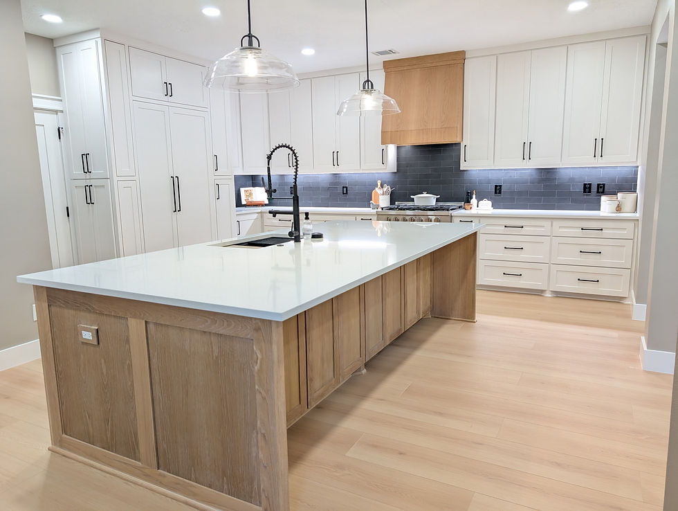 Full kitchen renovation with wood accents and large island