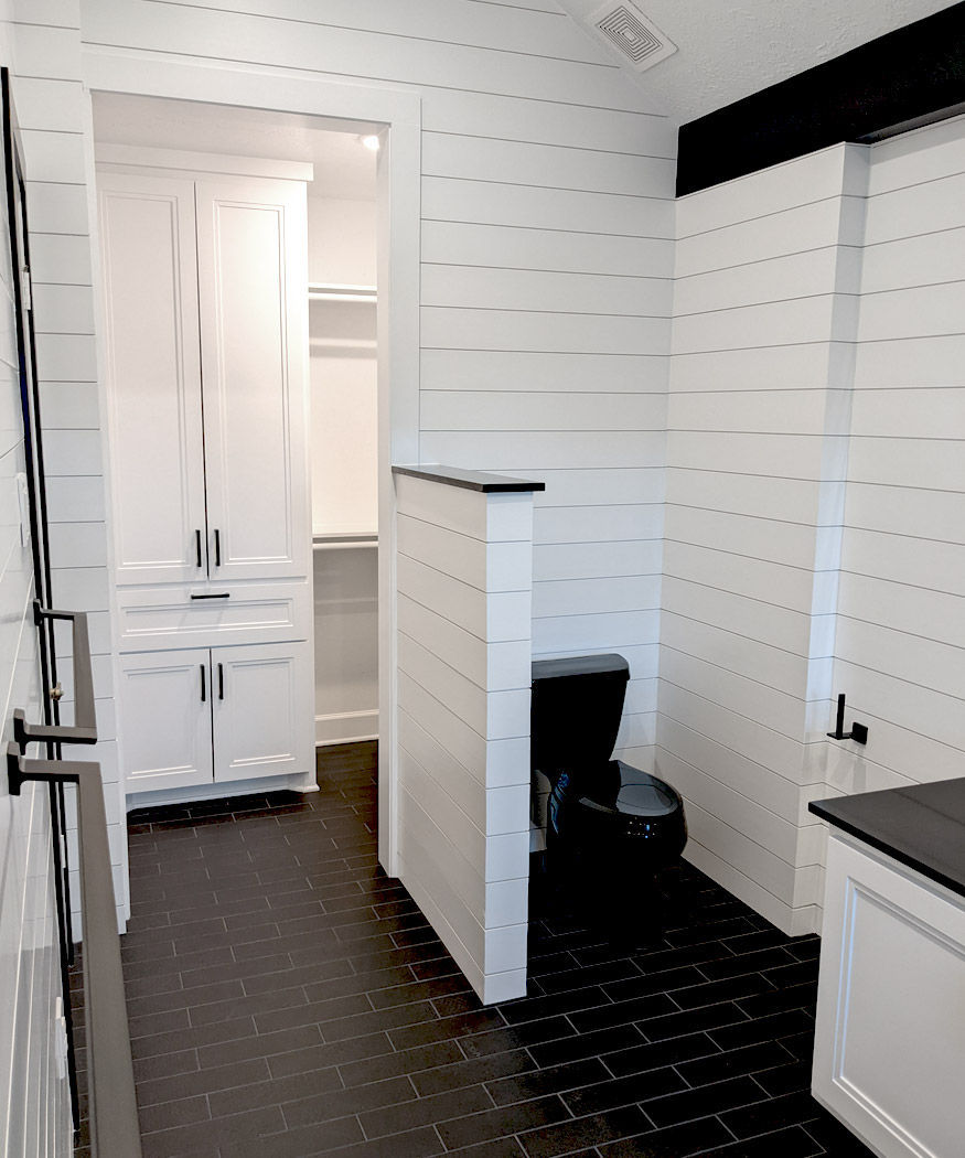 we removed the original toilet room wall and shower to relocate the toilet and improve the flow in t