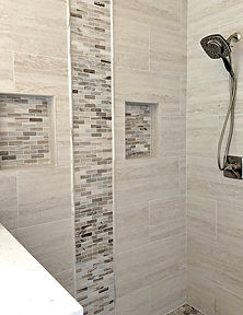 Recessed shampoo box accent tile waterfall marble