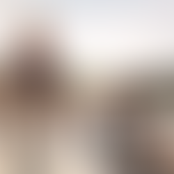 Family on the beach getting pictures while on vacation