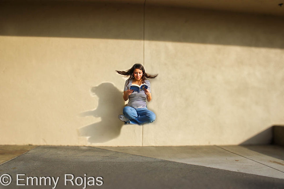 Jeylin reading a book in the air.