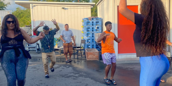 Kuaʻana Project Manager, Maddalyn Sesepasara, leads two Hoʻokahi Leo residents and two HHHRC staff members in a Zumba session.