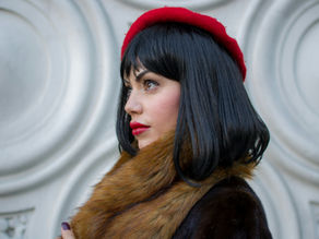 Mum Fatale wearing red listick and beret