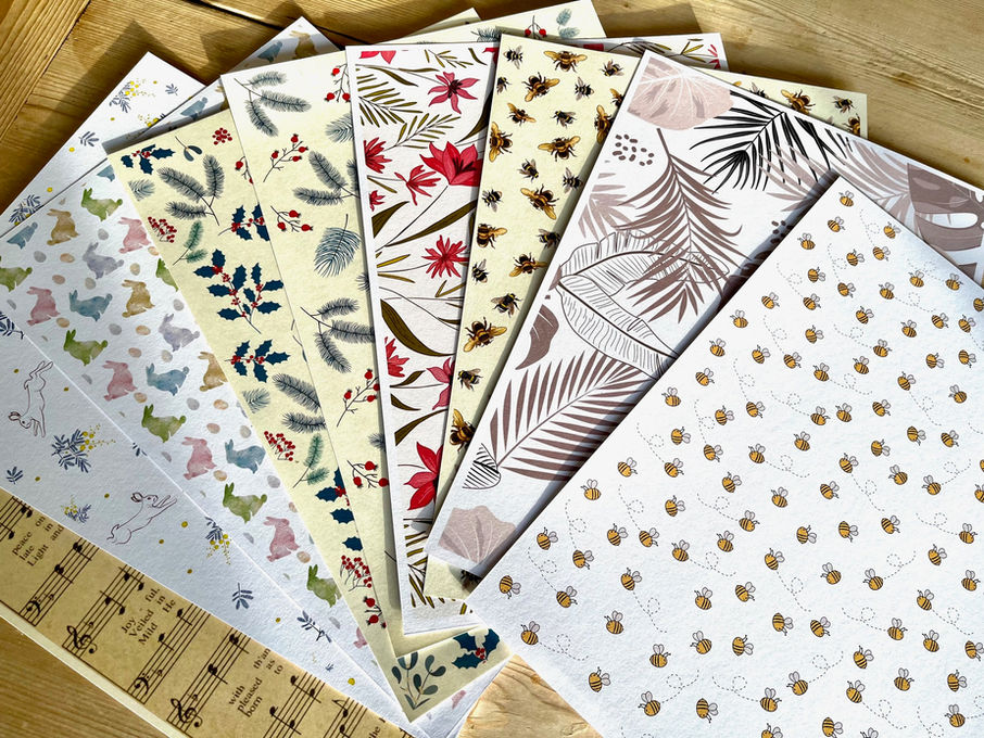 Printed A4 card showing various designs
