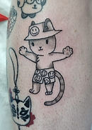 tatuagem de gato com chapéu