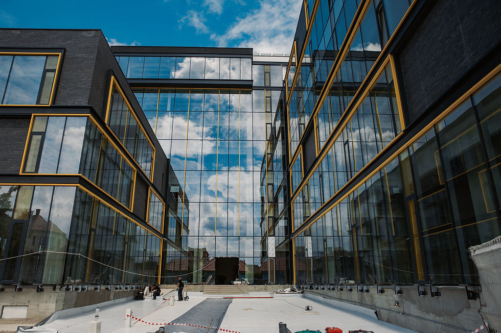 modern-office-building-exterior-reflecting-blue-sk-2026-03-18-11-00-16-utc.JPG