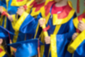 Kids Holding Diplomas