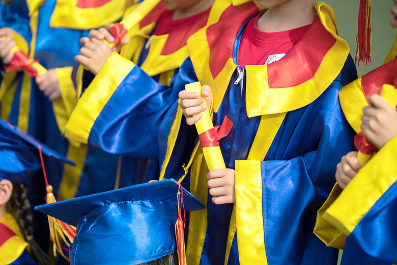 Kids Holding Diplomas