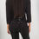 Miniaturbild: Reworked blouse with eyelets and leather bands