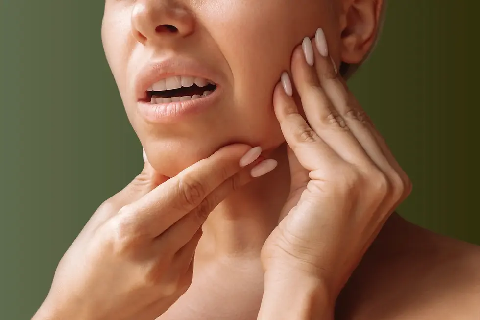 Close-up view of a therapist performing intra-oral massage on a patient’s jaw muscles