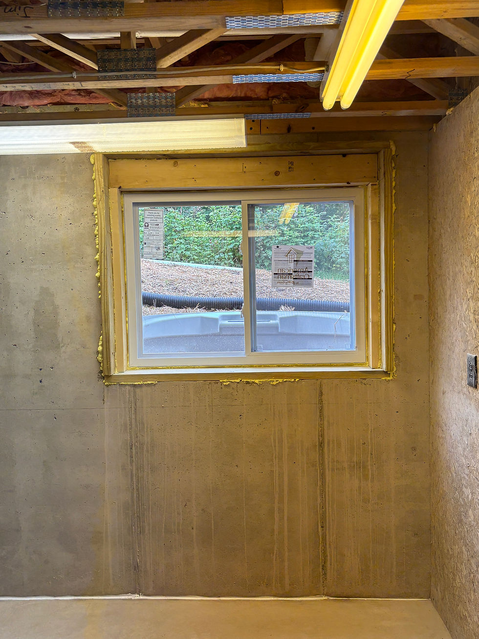 New egress window for a basement bedroom