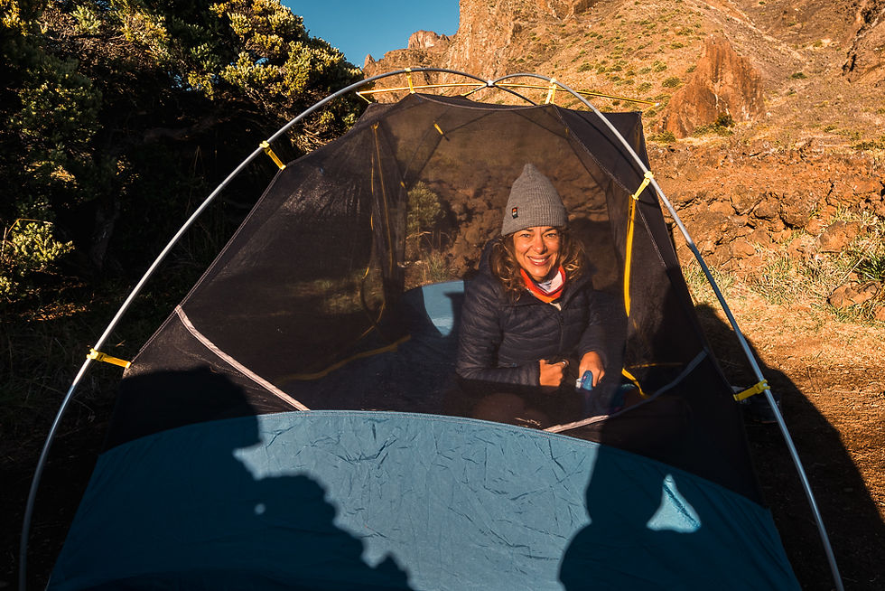 hiker girl in the open tent