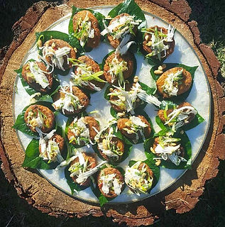 Cargo Catering Co. canapes Thai fish cakes on beatle leaf