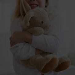 Girl Hugging Tedding Bear_edited.jpg