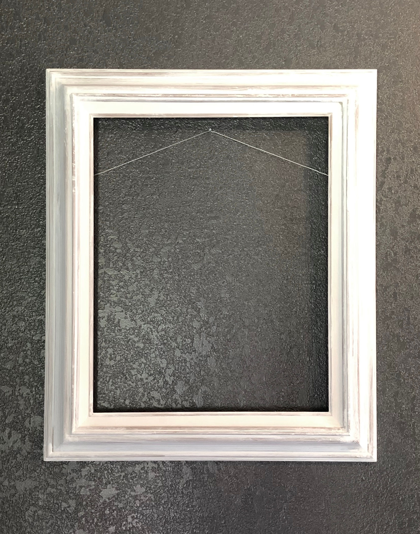 Antiqued white frame