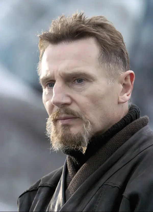 Batman Begins (2005) image accompanying the Ra’s al Ghul entry featuring Liam Neeson.