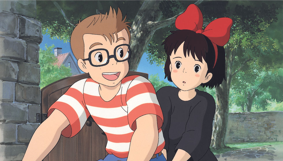 Anime boy in red-and-white striped shirt and glasses rides a bike, with a girl in a red bow behind him in a leafy yard.