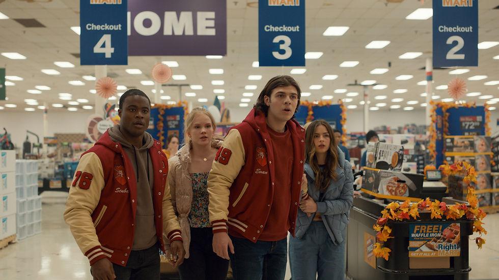 Four teenagers look surprised inside a store in The Oath.