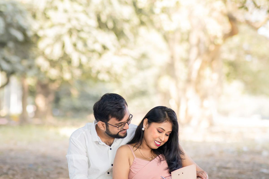 Couple enjoying a romantic picnic in a green park