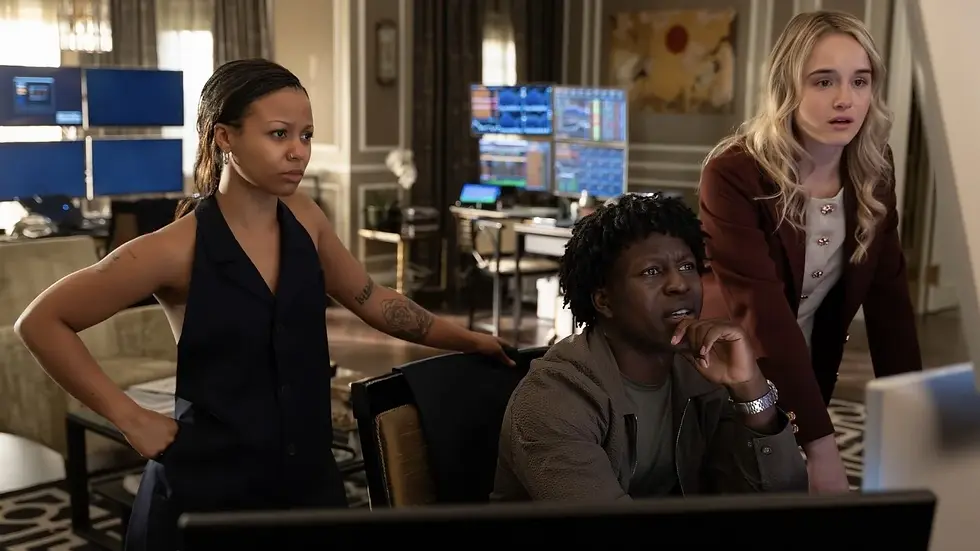 Three tense coworkers watch computer monitors in a high-tech control room, one standing with hands on hips, two leaning in.