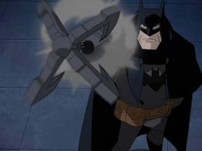 Illustration of Batman in a dark suit against a blue-gray background.