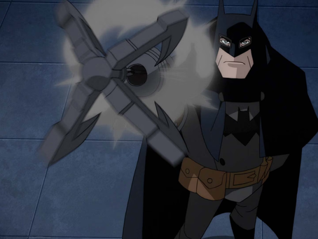 Illustration of Batman in a dark suit against a blue-gray background.