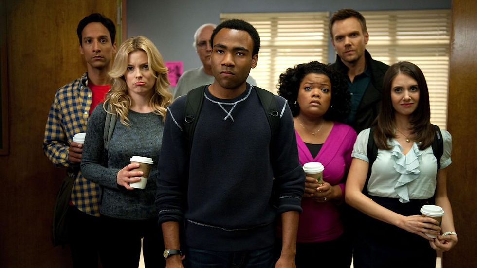 Six people stand closely, holding coffee cups, with serious expressions. They're indoors, in front of blinds and a wooden door.