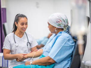 Caregiver and patient getting treatment