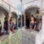 Couple touring the National Palace of Pena in Sintra, Portugal.