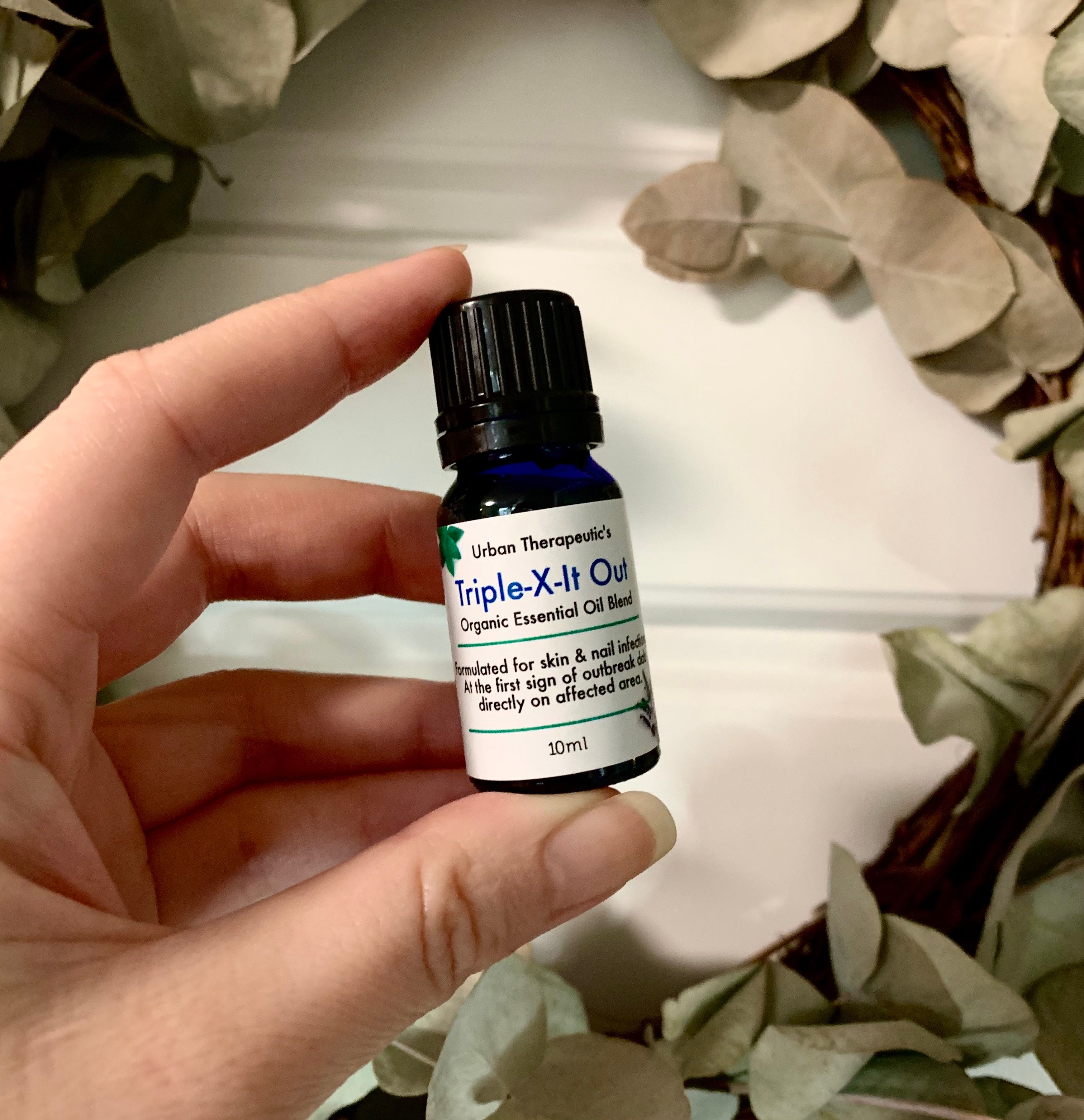Product: Triple X it Out - Nail & Skin Essential Oil Blend