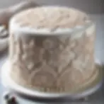 Christmas Cake Decoration - Edible Lace and Delicate Detailing: A Touch of Elegance