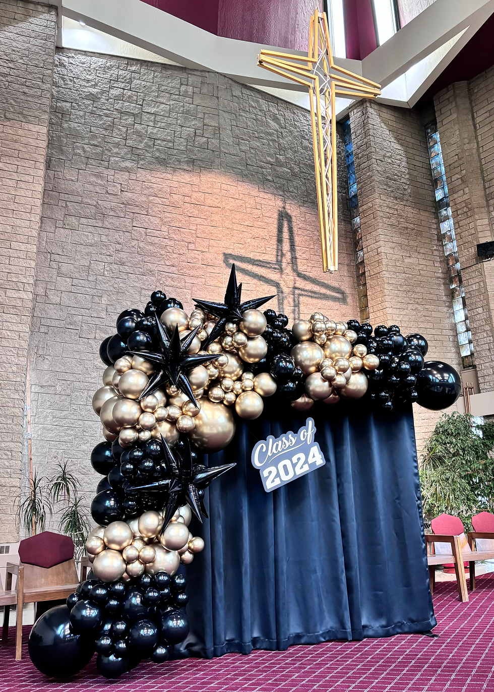 Balloon Backdrop & a sign