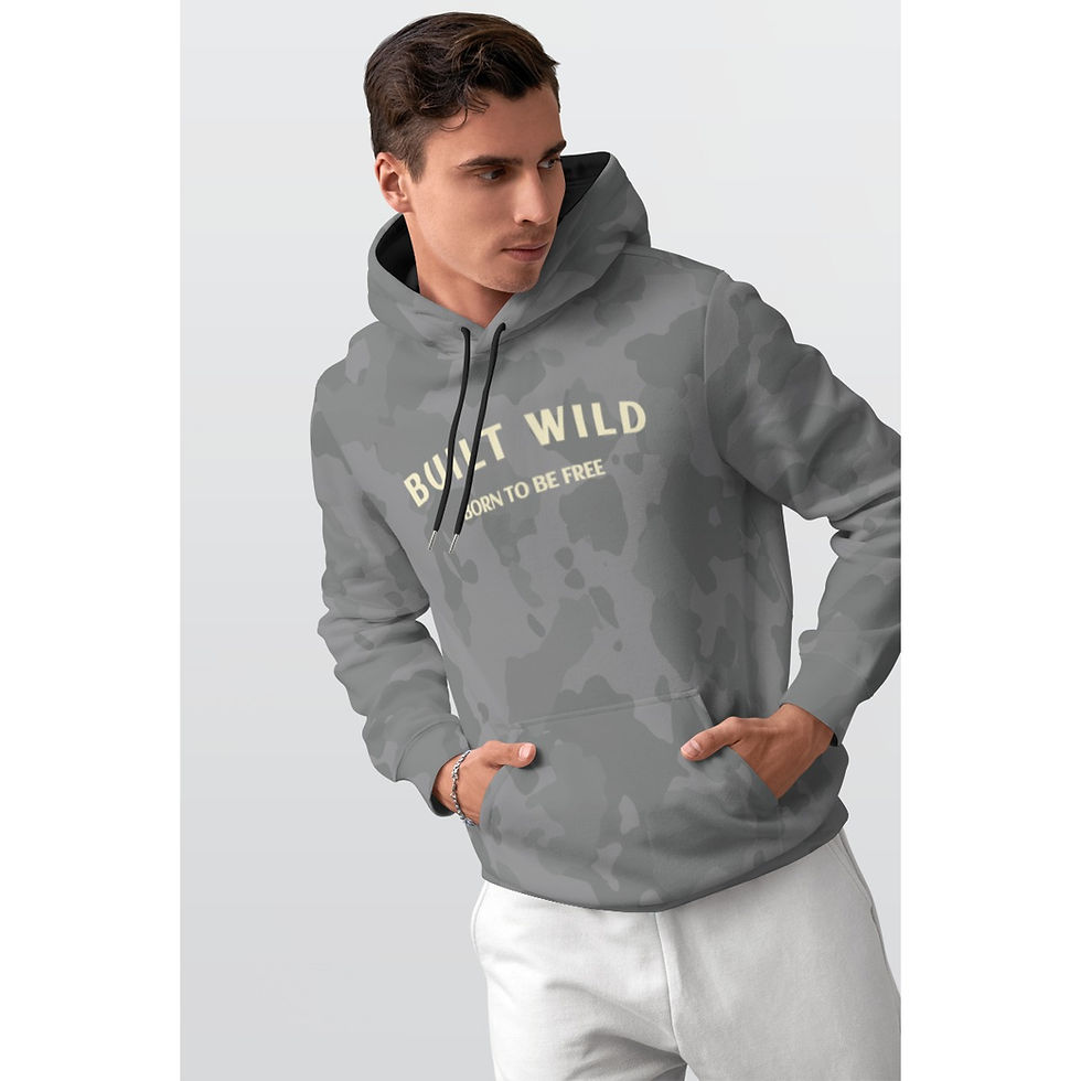 Man in gray hoodie with "BUILT WILD BORN TO BE FREE" text