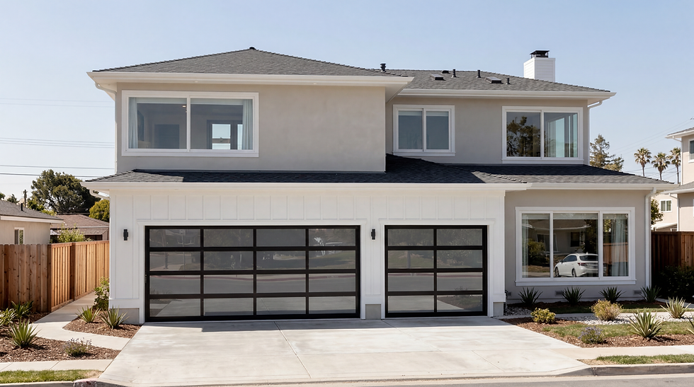 A modern full-view aluminum and frosted glass garage door installed on a contemporary Irvine residence, showcasing clean lines and architectural privacy.