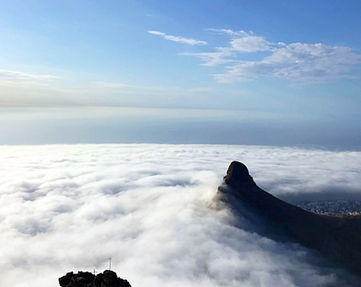 Lions Head in the clouds. Looking down from India Venster