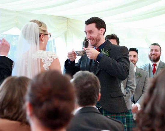 Husband gives his speech at the wedding dinner