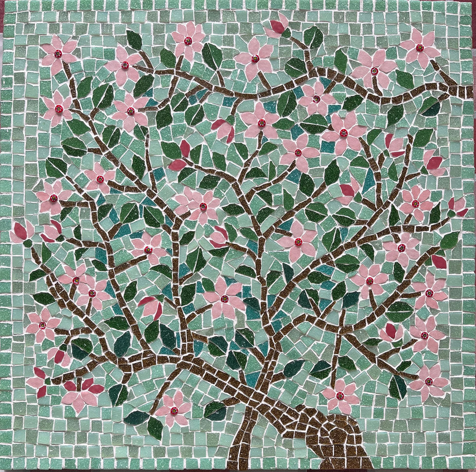 This handcrafted mosaic features a flowering tree in full bloom is composed of carefully cut glass tiles. Soft pink blossoms and deep green leaves spread across gently curving branches, set against mint green tesserae background. Inspired by nature and renewal, this mosaic symbolises life, growth and harmony. It brings warmth, serenity and beauty to any space. Size 40x40 cm. 